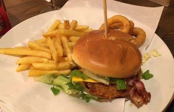 Served on a napkin, both the chicken burger and bacon & cheese burger were exactly what you’d expect. They each came with a portion of fries and onion rings.
