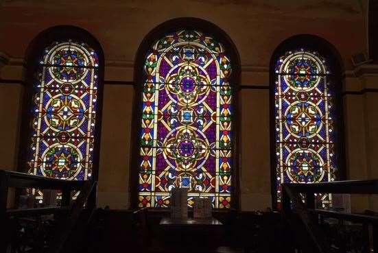 The pub may be a little dark, but the stained glass windows are spectacular