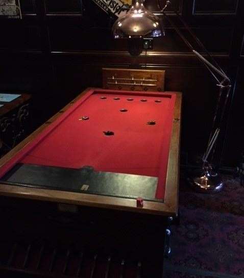 A great pub game – bar billiards might is as traditional as it gets but the light and red baize are a bit different