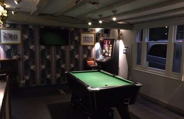 As you walk into the pub the area to the right is set aside for pool and darts. There is also a screen (which was off) and a fruit machine (which wasn’t used while we were in).