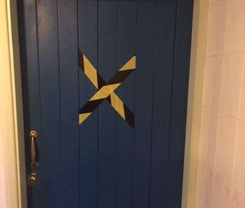 The cubicle in the gents seemed to be out of use for some reason and was marked with a cross