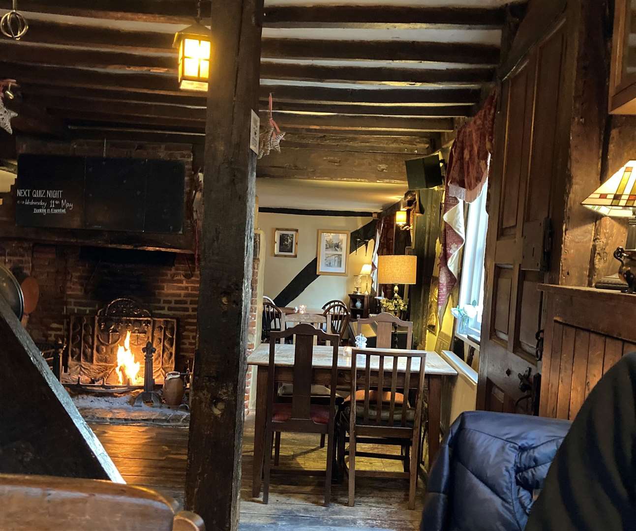 Once you’re through the bar, the rest of the pub opens up into a large dining area with separate ‘rooms’ only divided by ancient, upright beams