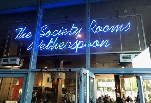 Announcing itself in blue neon lights, the Society Rooms at Brenchley House is one of two Wetherspoon pubs in Maidstone