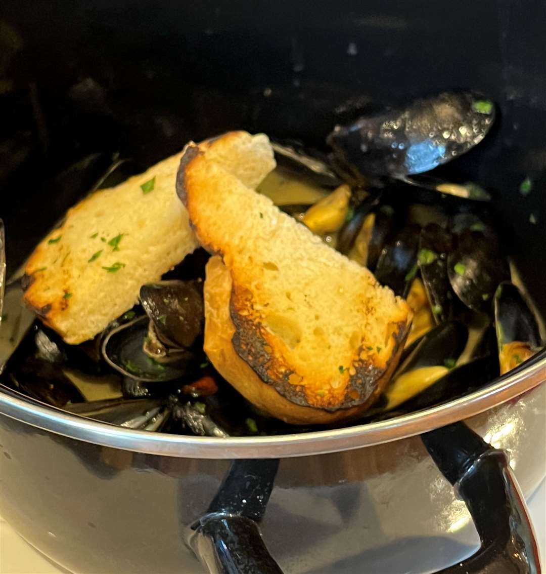 The mussels came with some slightly singed garlic bread