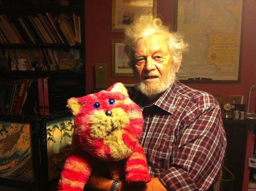 Peter Firmin at home with the original Bagpuss