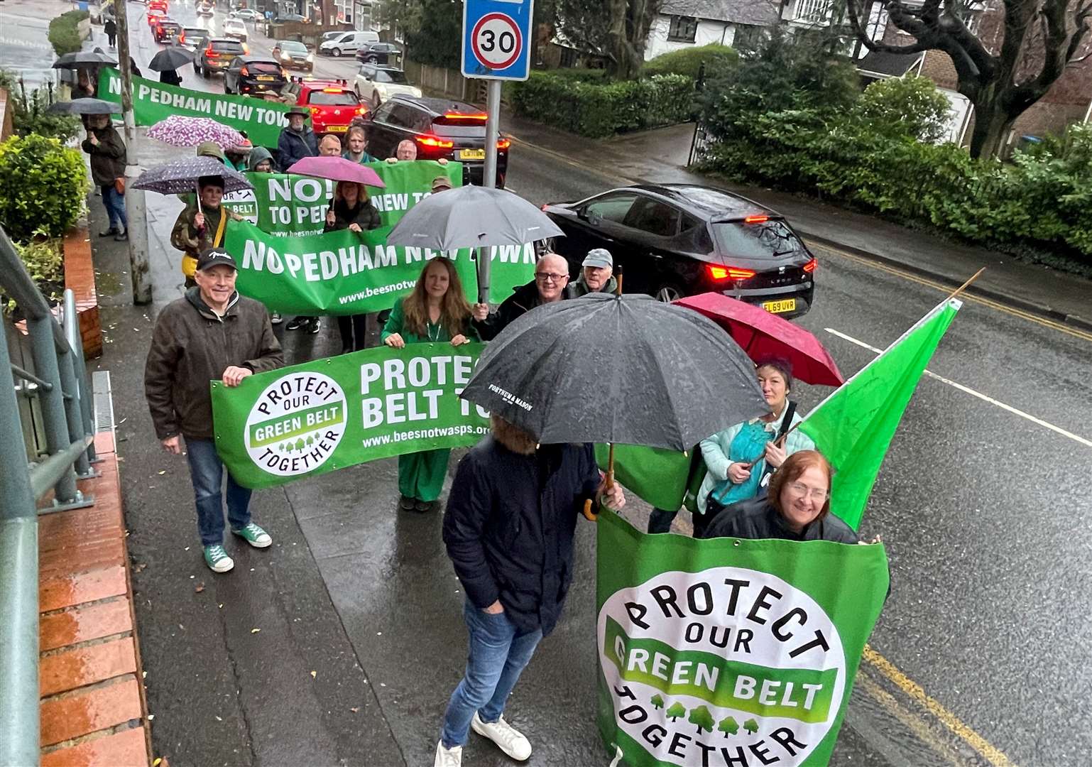 A protest was held over plans to build a 2,500 home garden village at Pedham Place golf course. Photo: Protect The Green Belt Together
