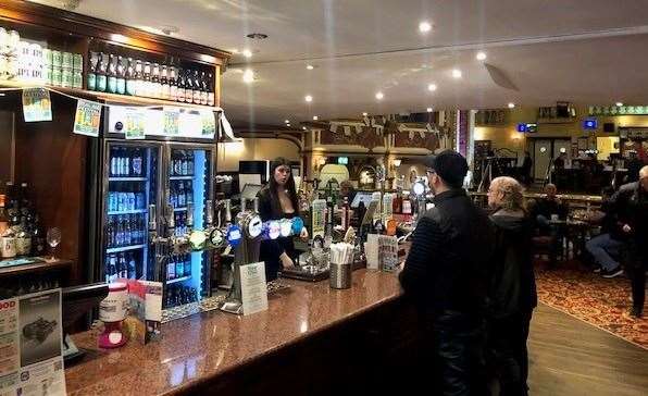 This large corner bar near the front of the pub had 24 different drinks available on draught
