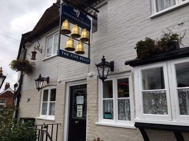 Gold and gleaming, the five bells at The Five Bells on Church Road in Seal look as if, along with the rest of the outside of the pub, they have had a new coat of paint