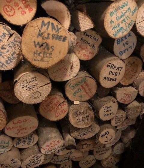Keeping a log of who visits The Shipwright’s – this firewood store at the front was full of colourful messages