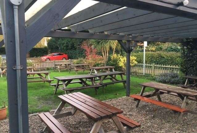 At the back of the pub there is a good sized garden with plenty of picnic tables and there’s also a decent sized covered area