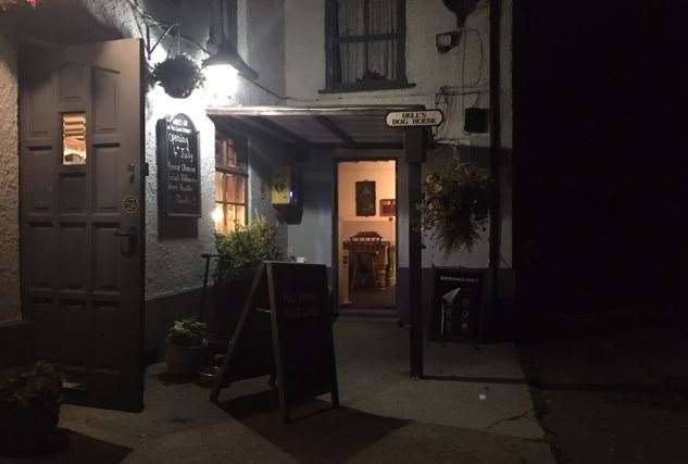 Dell’s Dog House is little more than a roofed smoking area, but it also houses a defibrillator and is currently the only entrance to the pub