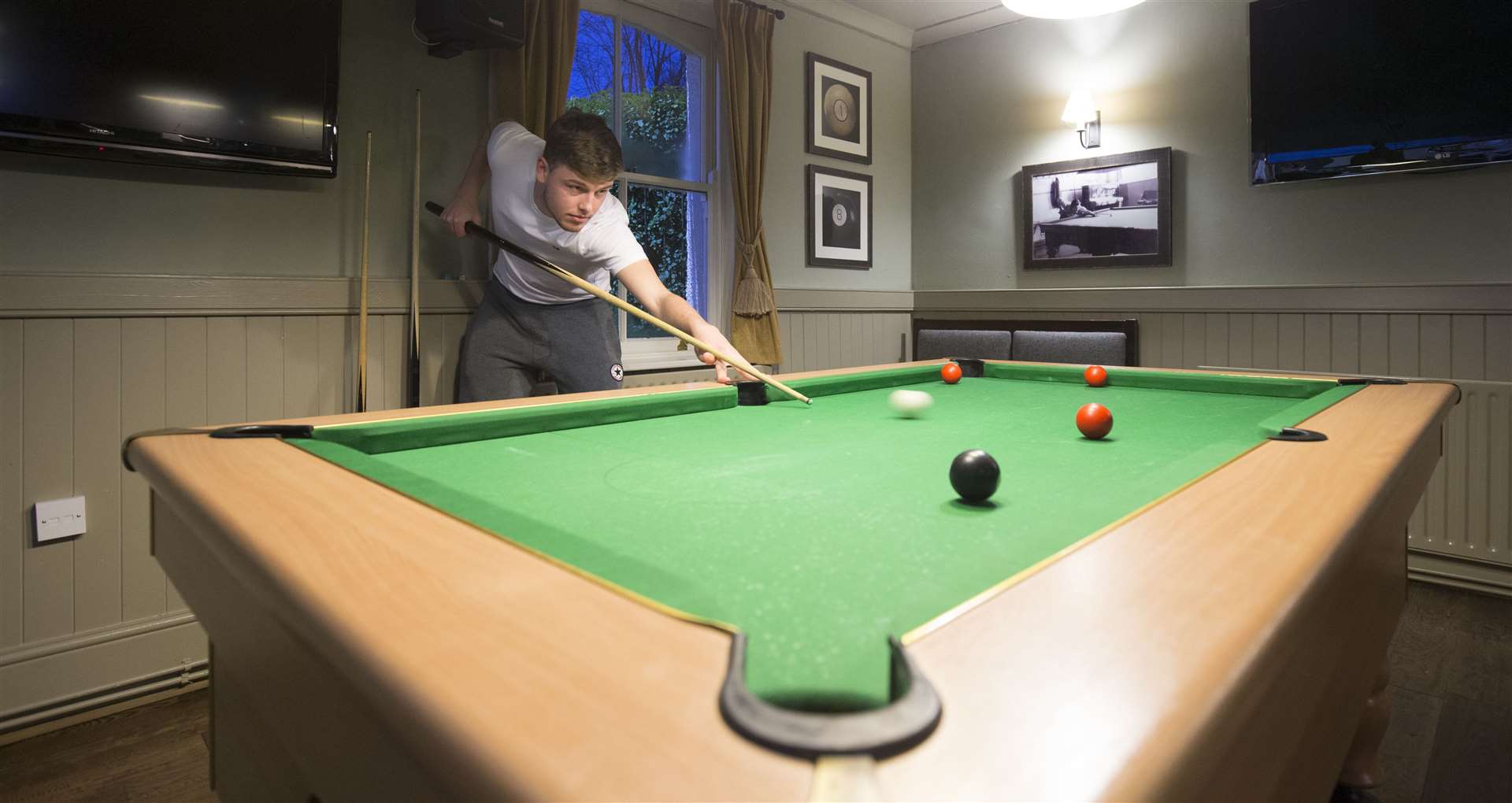 There's also a pool table plus plenty of TV screens showing live sport