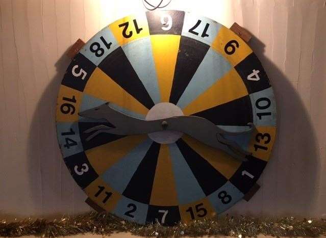 Spin the wheel to see if you can win a prize – the trouble is, it always lands on the same number!