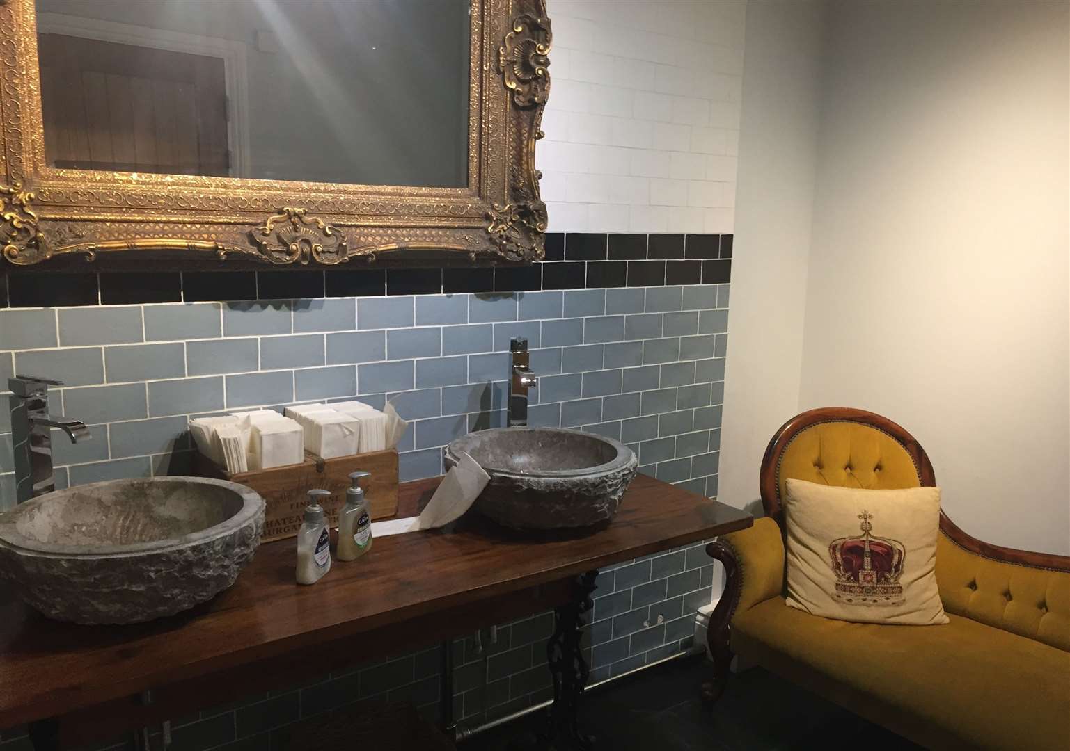 The ladies toilet in The Queen's not only boasts trendy basins and a choice of hand cream, but also the opportunity to sit awhile and chill out