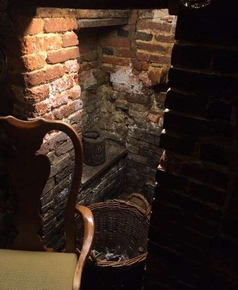The centuries-old building is packed full of great features. This cute little cubbyhole sits at the left hand side of the fire.