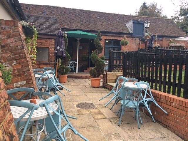 There are plenty of chairs and tables available for dining outside when the weather allows