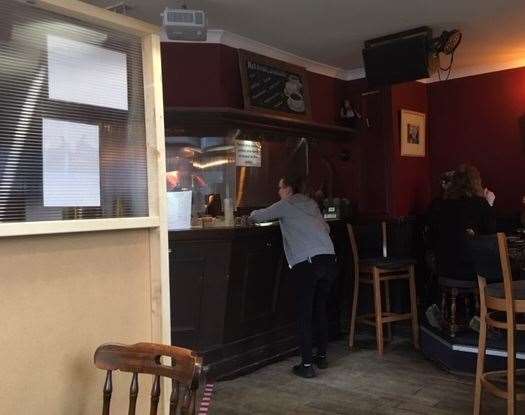 Plastic screens have been put up at the bar and the staff were taking care to make sure everyone was following the rules to social distance