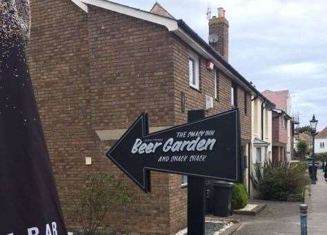 From the first advert I spotted down the road, to the first sign I saw when I arrived, this pub is keen to push its beach-themed garden area.