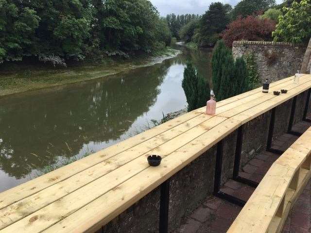 Outside new benches and trestle tables have been installed to give as many people as possible a view of the river