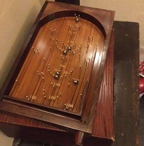 This is about as traditional as you’ll find so there’s no darts, pool, or any other type of pub game, though I did spot this wooden bagatelle
