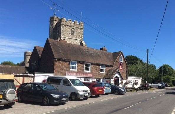 Walking up to The Bell, which sits right on the roadside in Ivychurch, you can’t help but notice the church tower sitting directly behind the pub